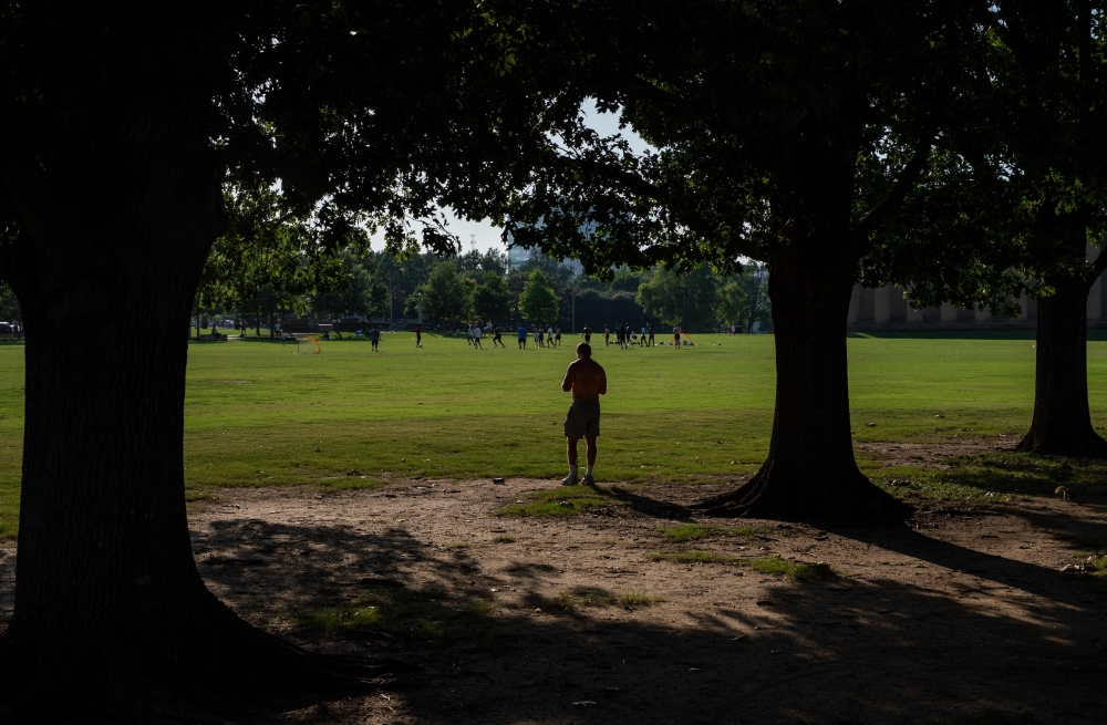 A man looks on at Centennial Park during an extreme-heat warning in Nashville, Tennessee. The heat wave, stretching from the Midwest to the East Coast, will affect as many as 90 million Americans. (Photo by Seth Herald /AFP)
