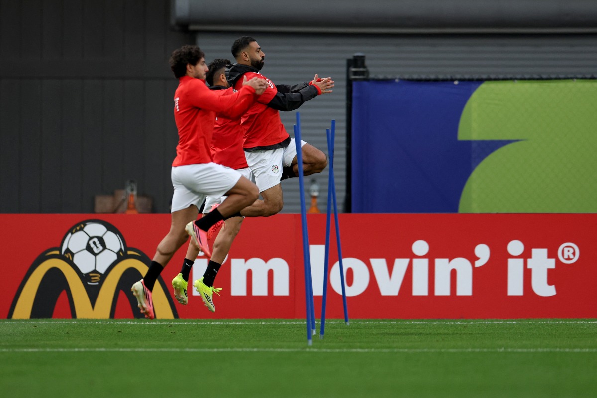 Egypt's Mohamed Salah (right) takes part in a training session with teammates.