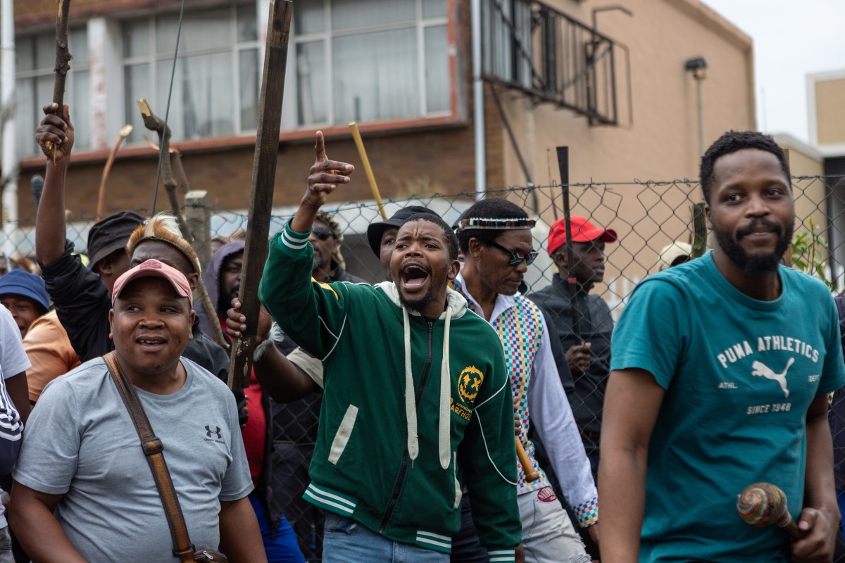 Protesters march during a demonstration against illegal immigration in Durban, South Africa, June 30, 2026. (Photo by Mbuthi Msweli/Xinhua)