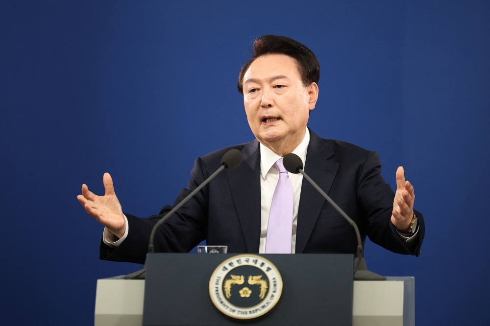 (Files) Republic of Korea President Yoon Suk Yeol answers a reporter's question during a press conference at the Presidential Office in Seoul on November 7, 2024. (Photo by Kim Hong-Ji / Pool / AFP)