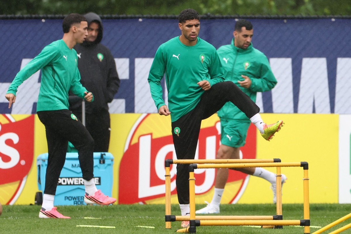 Morocco’s Bilal El Khannouss and Achraf Hakimi  (centre) take part in a training session. (PICS: AFP)