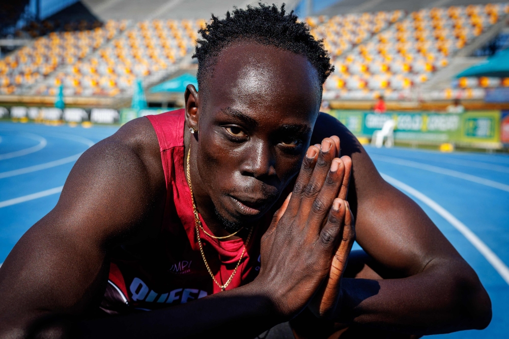(Files) Gout Gout of Australia celebrates after winning the 100m final of the Australian Athletics Junior Championships at Queensland Sport and Athletics Centre in Brisbane on April 18, 2026. (Photo by Patrick Hamilton / AFP) 