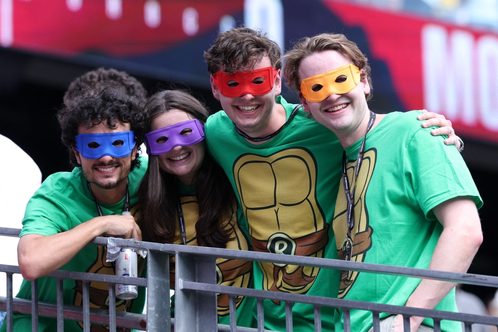 France fans pose for photos before the FIFA World Cup 2026 Quarter Final match between France and Morocco at Boston Stadium on July 09, 2026 in Foxborough, Massachusetts. Kevin C. Cox/Getty Images/AFP 