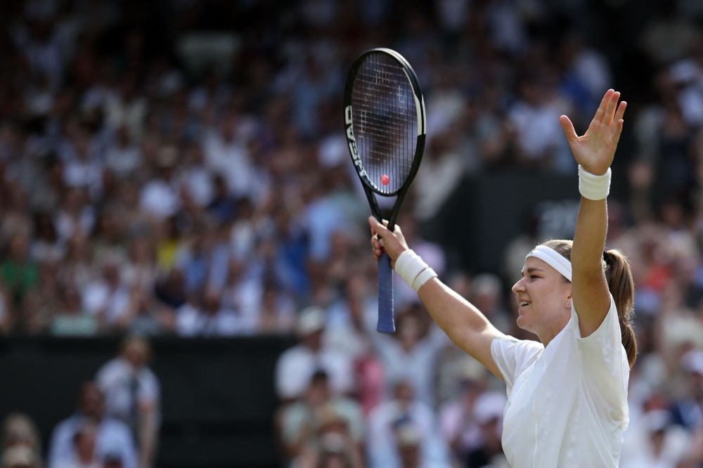 Czech Republic's Karolina Muchova celebrates beating US player Coco Gauff in Wimbledon, southwest London, on July 9, 2026. (Photo by Henry Nicholls / AFP)