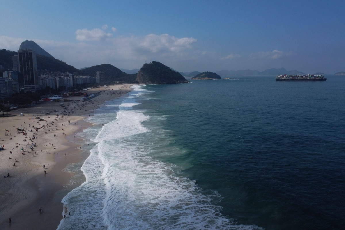 Aerial view of Copacabana Beach during the austral winter in Rio de Janeiro, Brazil on July 9, 2026. (Photo by Pablo PORCIUNCULA / AFP)