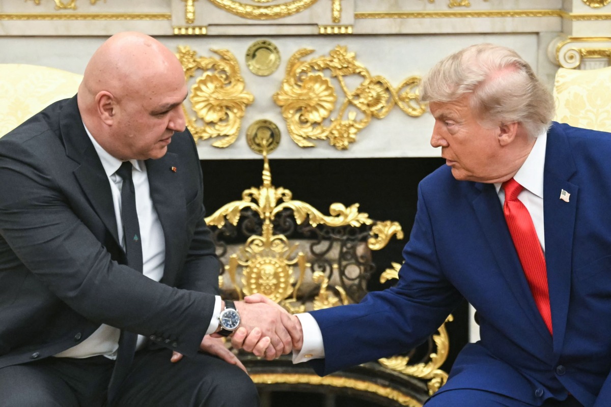 US President Donald Trump shakes hands with Lebanese President Joseph Aoun in the Oval Office of the White House in Washington, DC, on July 21, 2026. (Photo by SAUL LOEB / AFP)