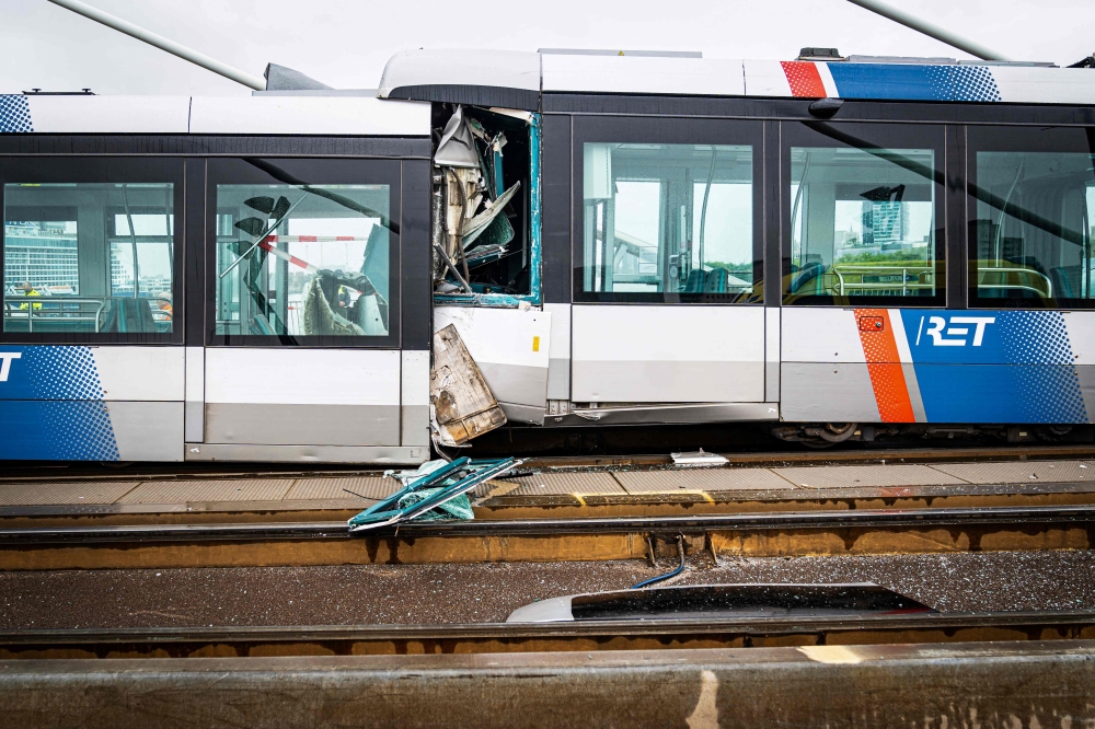 A photograph taken on July 22, 2026 shows the site of an accident involving two trams that collided on the Erasmus Bridge, in Rotterdam, injuring 18 people including two in serious conditions. (Photo by Mitchell de Kwant / ANP / AFP) / Netherlands OUT