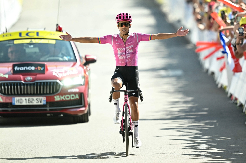 EF Education - EasyPost team's Ecuadorian rider Richard Carapaz cycles to the finish line to win the 18th stage of the 113th edition of the Tour de France cycling race, 185 km between Voiron and Orcières-Merlette in the French Alps, on July 23, 2026. (Photo by Loic VENANCE / AFP)