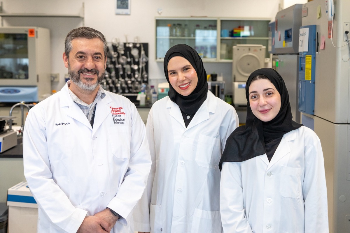 Ihab Younis with Mariam Elesnawy and Hana Hasna, two of the alumni co-authors.