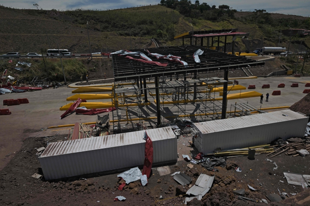 Aerial view after a toll plaza was attacked in Santander de Quilichao, Cauca department, Colombia, on August 8, 2026. (Photo by JOAQUIN SARMIENTO / AFP)