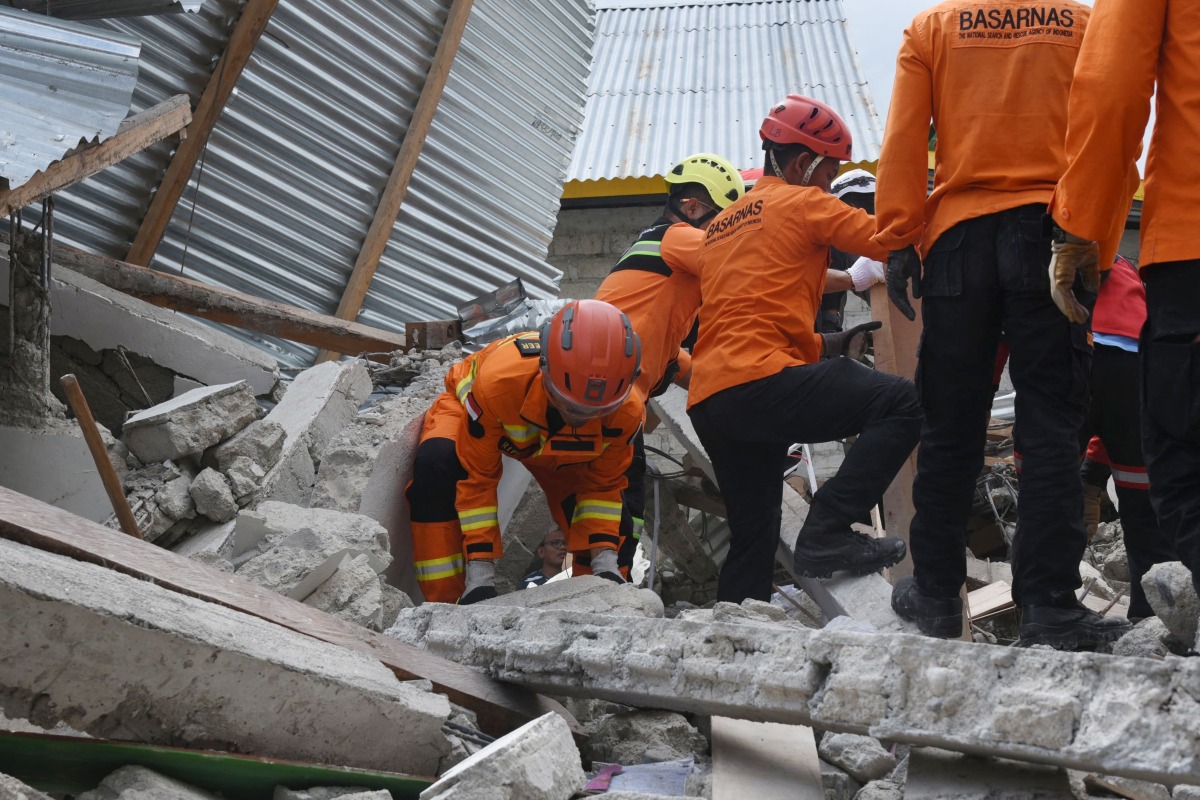 This handout picture taken and released on August 19, 2026 by Indonesia's Search and Rescue Agency (BASARNAS) shows rescue personnel from the agency working at the scene of a collapsed building in East Manggarai following a 7.7-magnitude earthquake that struck Indonesia's Flores island on August 15. Photo by Handout / INDONESIA'S NATIONAL SEARCH AND RESCUE AGENCY (BASARNAS) / AFP