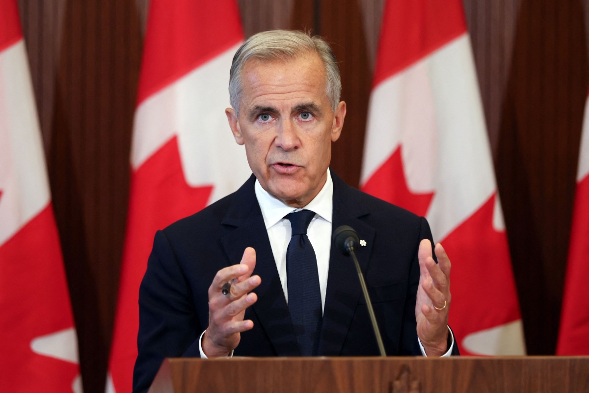 Canadian Prime Minister Mark Crney speaks at a press conference in Ottawa, Ontario, on August 22, 2026 after trade talks with the US collapsed. Photo by Dave Chan / AFP