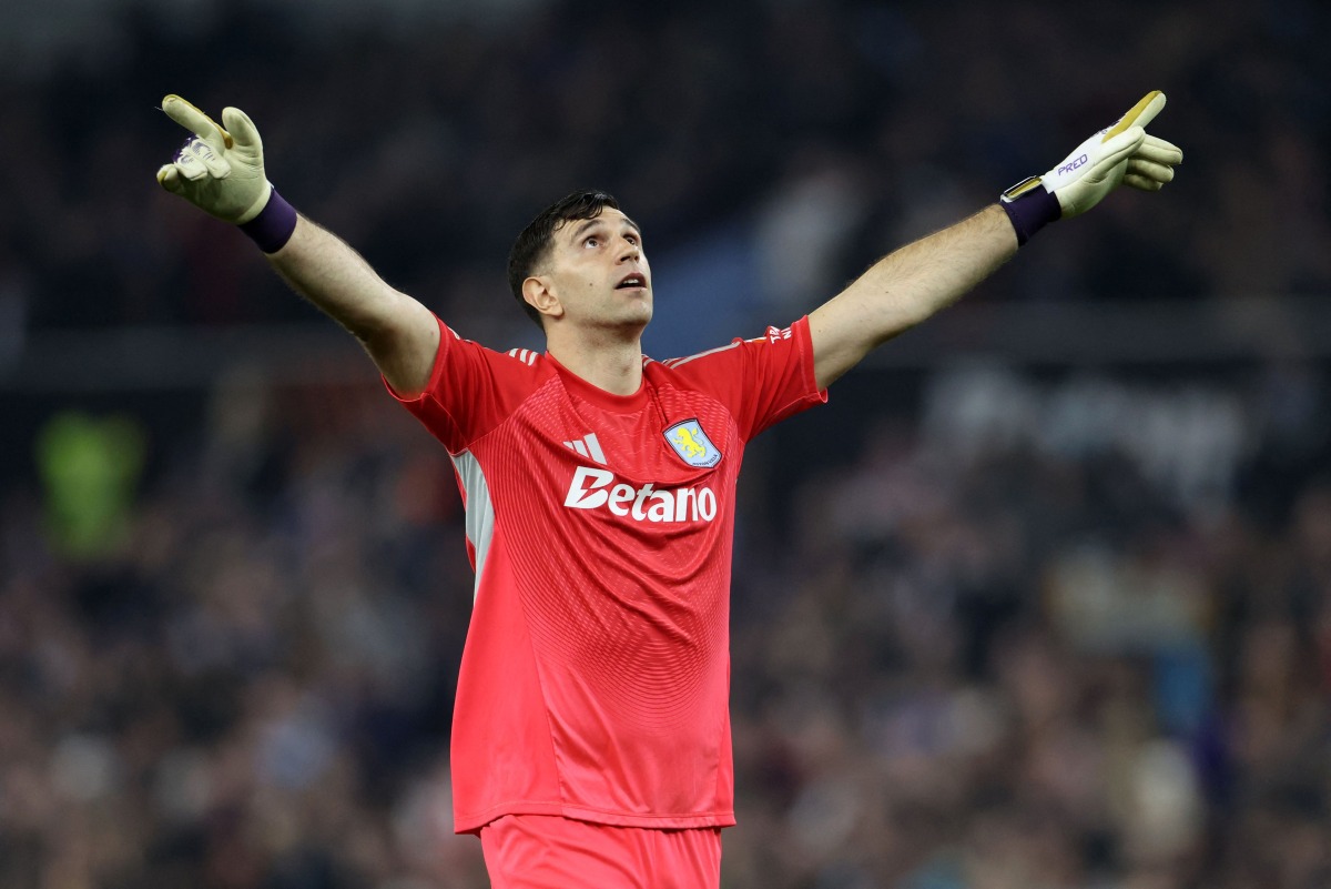 Aston Villa's Argentinian goalkeeper #23 Emiliano Martيnez celebrates his team's second goal during the UEFA Europa League, round of 16 second-leg football match between Aston Villa and Lille LOSC at Villa Park in Birmingham, central England on March 19, 2026. Photo by Darren Staples / AFP 