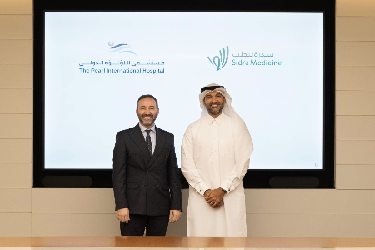 Chief Medical Officer at The Pearl International Hospital Dr. Cem Emir Guldogan and Chief Research Officer at Sidra Medicine, Prof. Khalid Fakhro at agreement signing event. 