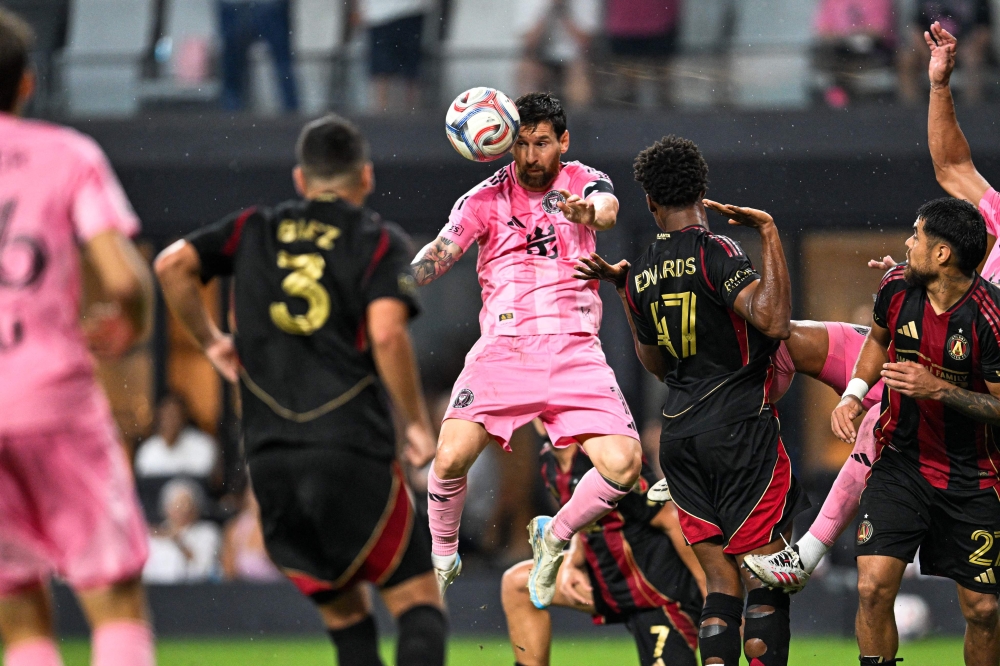 Inter Miami's Argentine forward #10 Lionel Messi goes up for a header during a Major League Soccer (MLS) regular season football match between Inter Miami CF and Atlanta United FC at Nu Stadium in Miami, Florida, on September 5, 2026. (Photo by CHANDAN KHANNA / AFP)