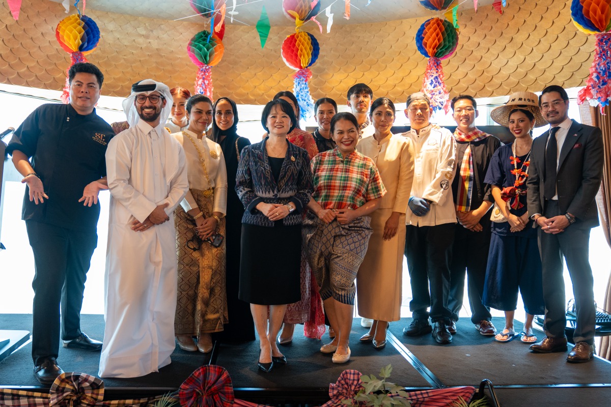 Ambassador-Designate of Thailand to Qatar H E Pensom Lertsithichai (fourth left) with other participants during the launch ceremony.