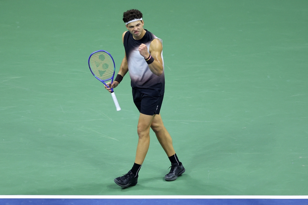 Ben Shelton of the United States celebrates a point against Frances Tiafoe of the United States during their Men's Semifinal match at USTA Billie Jean King National Tennis Center on September 11, 2026. Caleb Bowlin/Getty Images/AFP 