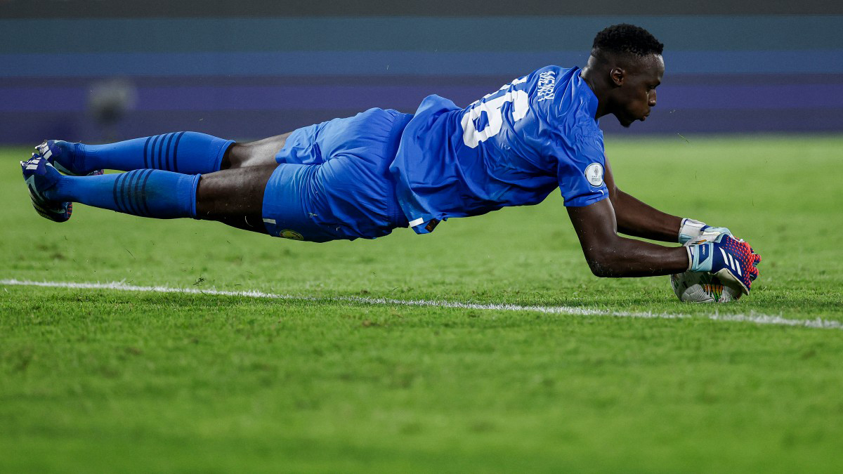 Senegal's goalkeeper #16 Edouard Mendy grabs the ball during the Africa Cup of Nations (CAN) 2024 round of 16 football match between Senegal and Ivory Coast at the Stade Charles Konan Banny in Yamoussoukro on January 29, 2024.