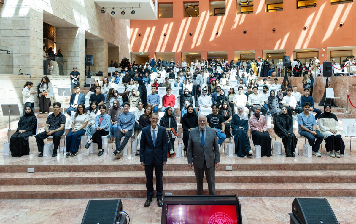 Dean Michael Trick with faculty members and students. 