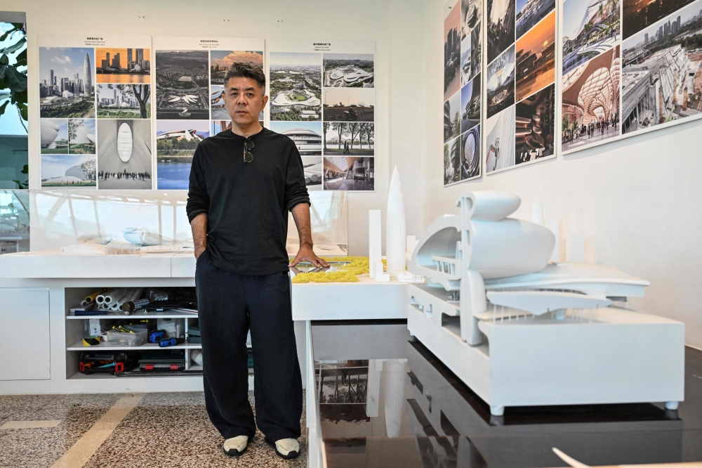 Chinese architect and founder of MAD Architects Ma Yansong poses for a photograph in Beijing on August 7, 2026. (Photo by Adek Berry / AFP) 