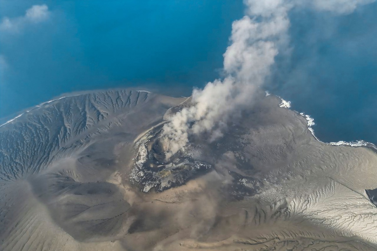 This handout aerial picture taken on September 6, 2026 and released on September 7, 2026 by the Indonesia's Center for Volcanology and Geological Hazard Mitigation shows the Mount Krakatau (Krakatoa) in the Sunda Strait, in South Lampung, Lampung province, spewing smoke and volcanic ash during an eruption. (Photo by Handout / Indonesia's Center for Volcanology and Geological Hazard Mitigation / AFP)