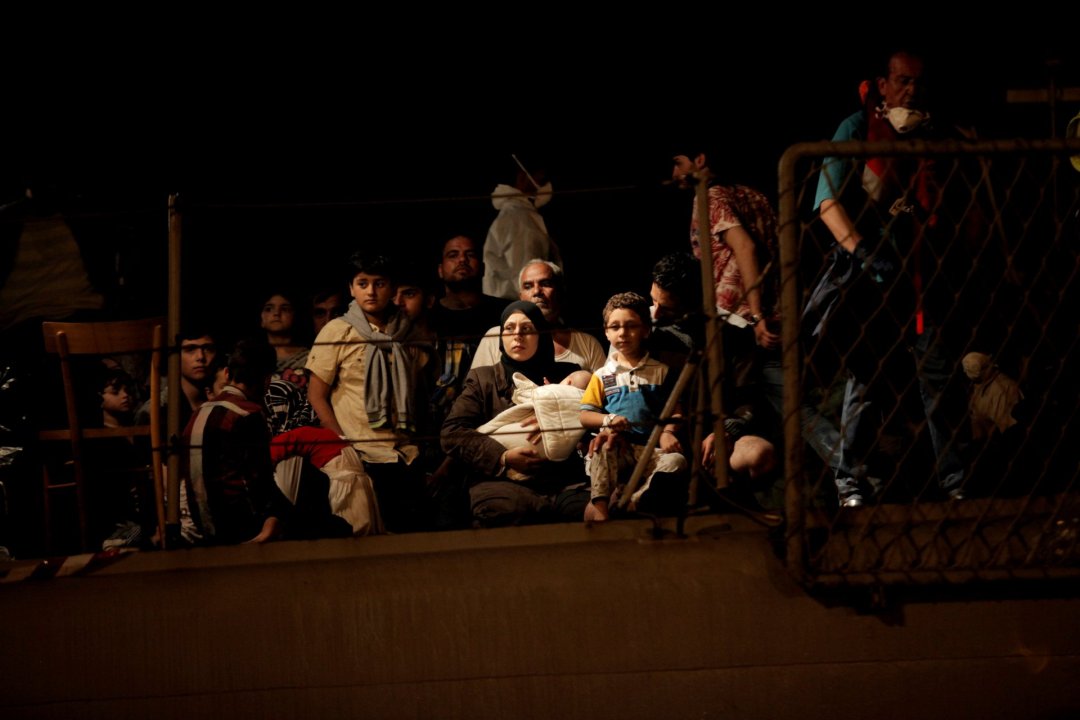 Italian Coast Guard rescues migrants and refugees bound for Italy. Photo: IOM/Francesco Malavolta