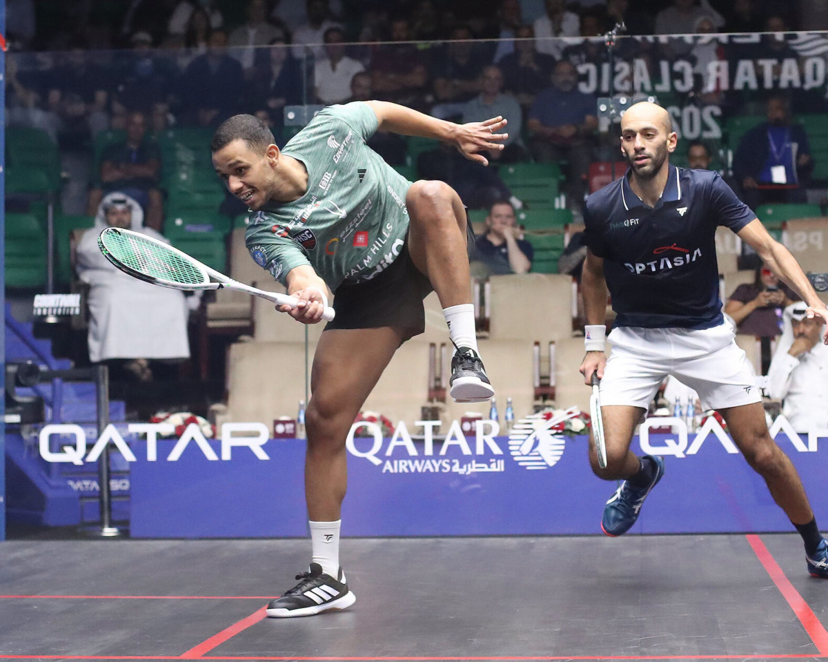 Mostafa Asal (left) in action against Marwan ElShorbagy. 