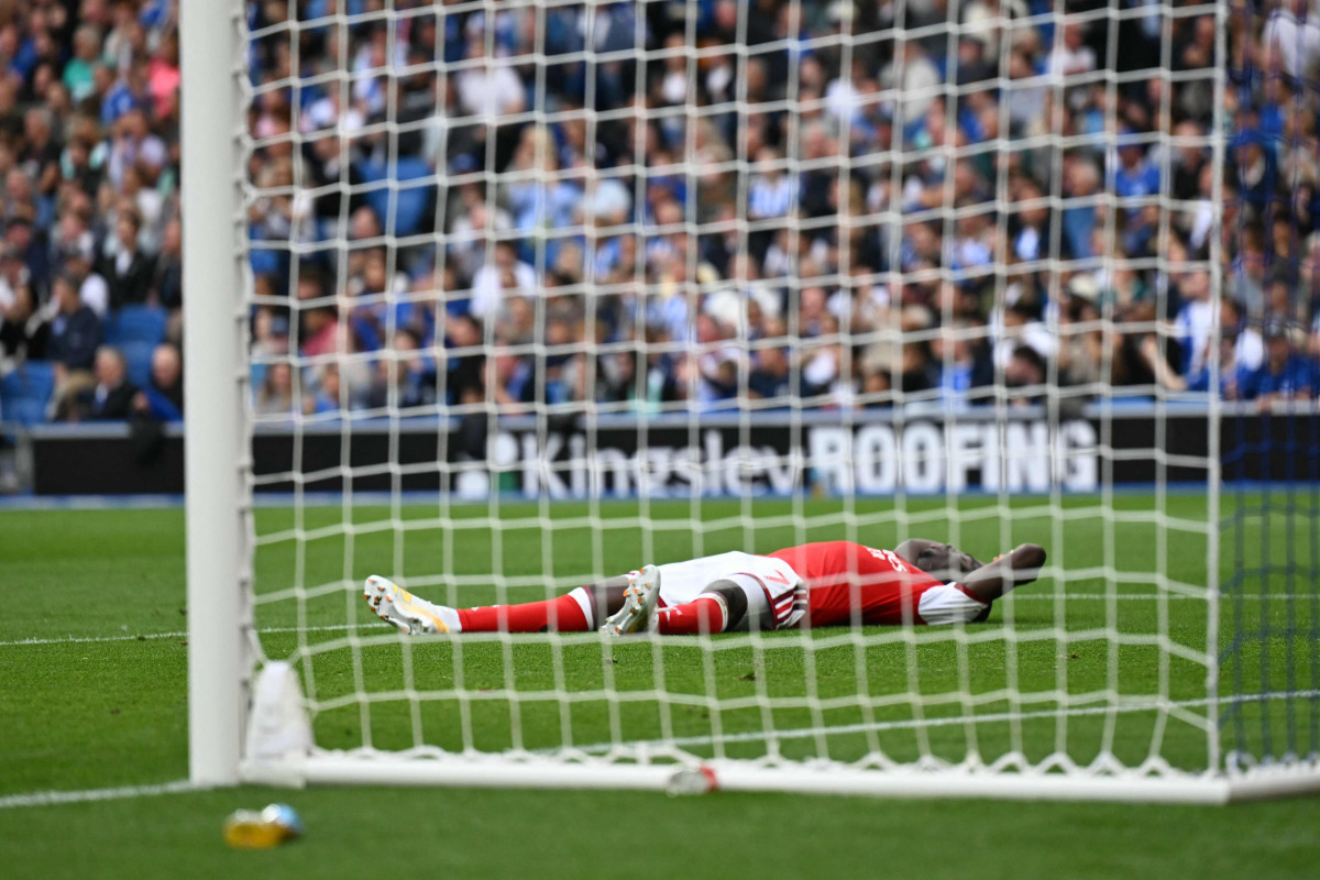Arsenal's English midfielder #07 Bukayo Saka reacts after failing to score during the English Premier League football match between Brighton and Hove Albion and Arsenal at the American Express Community Stadium in Brighton, southern England on September 19, 2026. (Photo by Glyn KIRK / AFP)