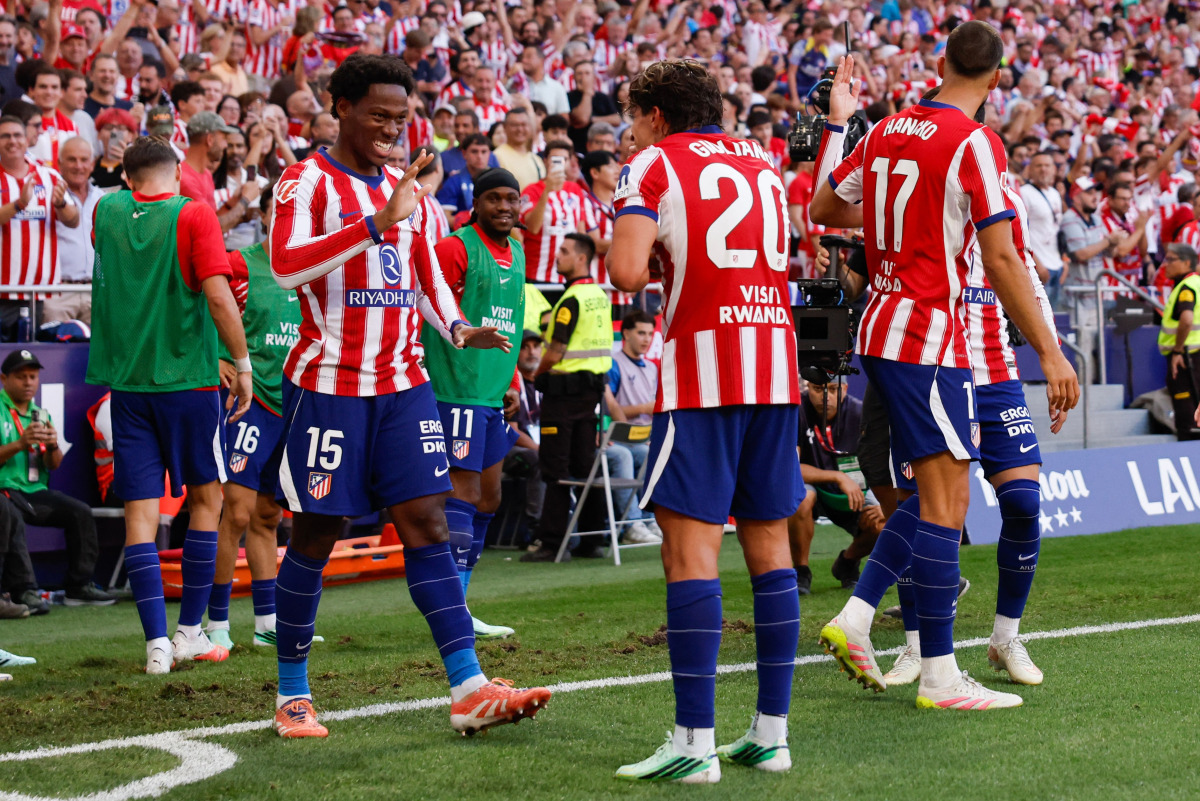 Atletico Madrid's Canadian forward #15 Jonathan David celebrates scoring his team's second goal during the Spanish league football match between Club Atletico de Madrid and Real Madrid CF at the Metropolitano stadium in Madrid on September 20, 2026. (Photo by Oscar DEL POZO / AFP)