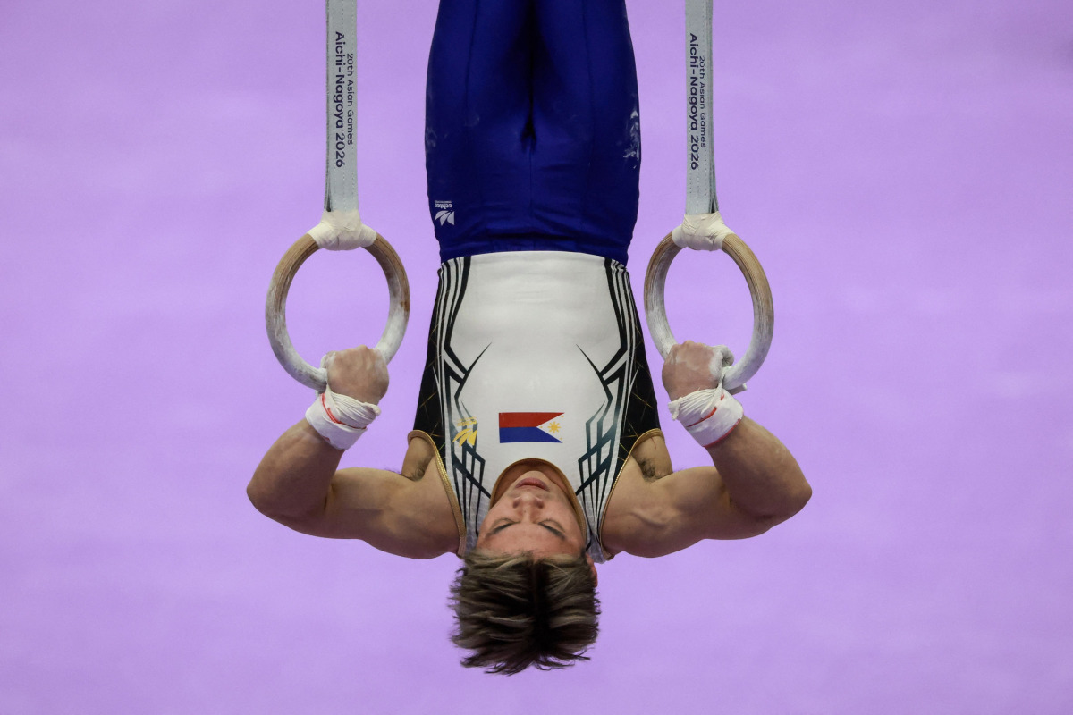 Philippines' Carlos Edriel Yulo competes on the rings in the men's artistic gymnastics team final during the 2026 Asian Games at the Nagoya City General Gymnasium in Nagoya, Aichi prefecture on September 23, 2026. (Photo by DAVID GRAY / AFP)