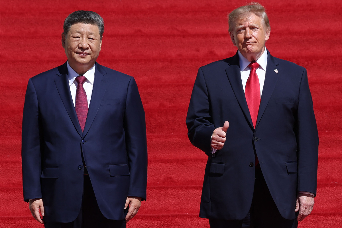 U.S. President Donald Trump (R) and President of China Xi Jinping (L) arrive for a tour of the National Archives Museum on September 25, 2026 in Washington, DC. (Photo by WIN MCNAMEE / GETTY IMAGES NORTH AMERICA / Getty Images via AFP)