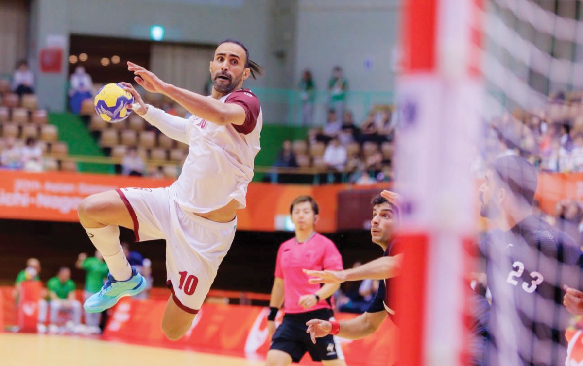 Qatar's Frankis Marzo prepares to shoot at the goal during the quarterfinal against Iran