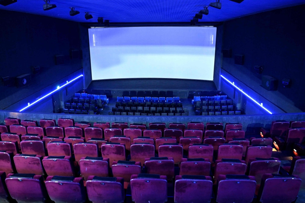 Interior view of the single-screen Mukunda Theatre in Bengaluru. (Photo by Idrees Mohammed / AFP)