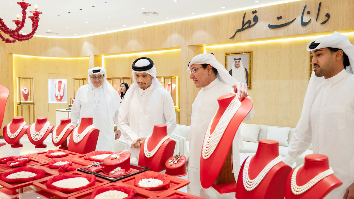 Prime Minister and Minister of Foreign Affairs H E Sheikh Mohammed bin Abdulrahman bin Jassim Al Thani views jewellery on display at the opening ceremony of DJWE 2026 yesterday.