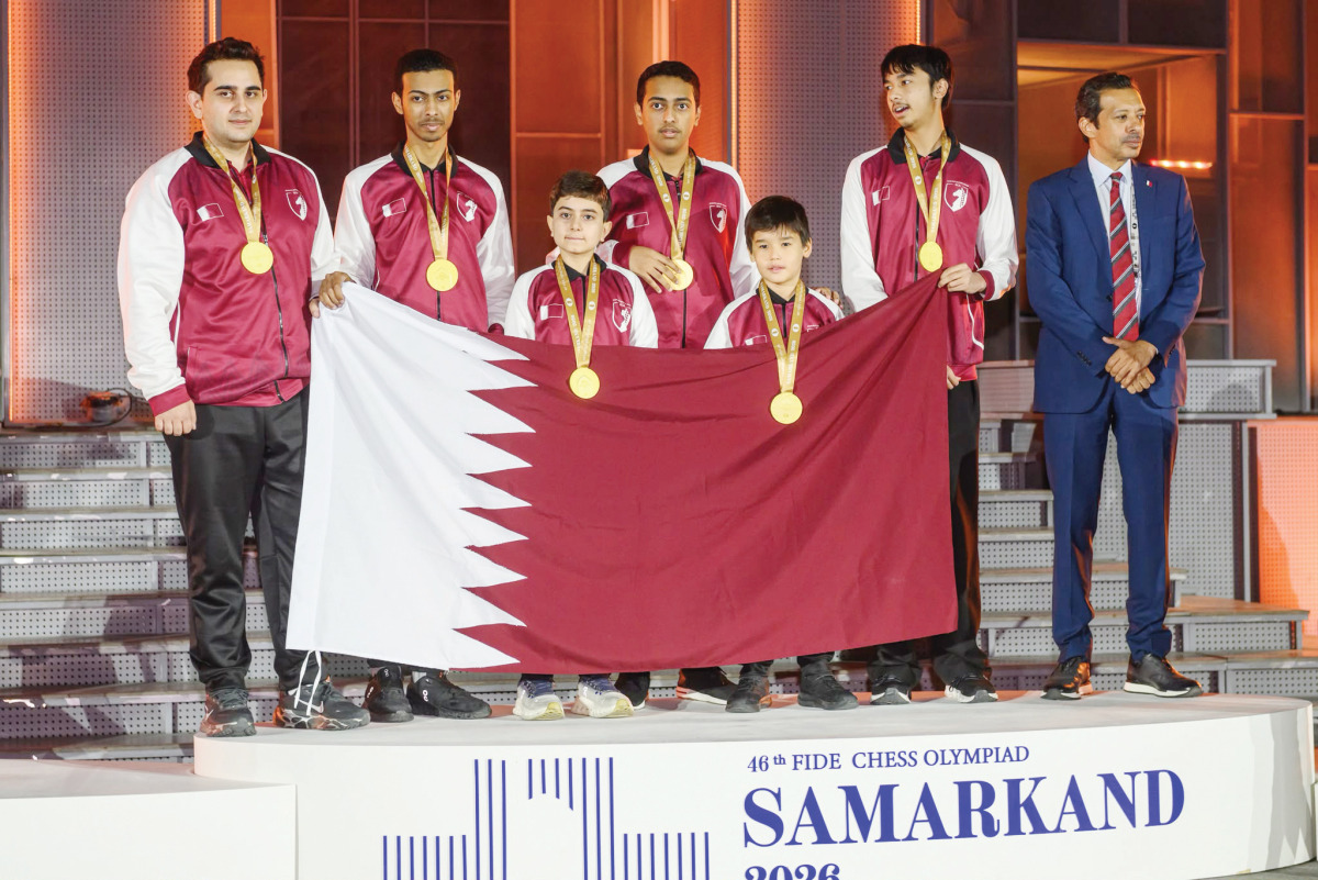 Qatar Chess Association President Mohammed Al Mudahka poses for a photo with the Qatar chess team which won the gold medal  at the 46th World Chess Olympiad in Samarkand, Uzbekistan.