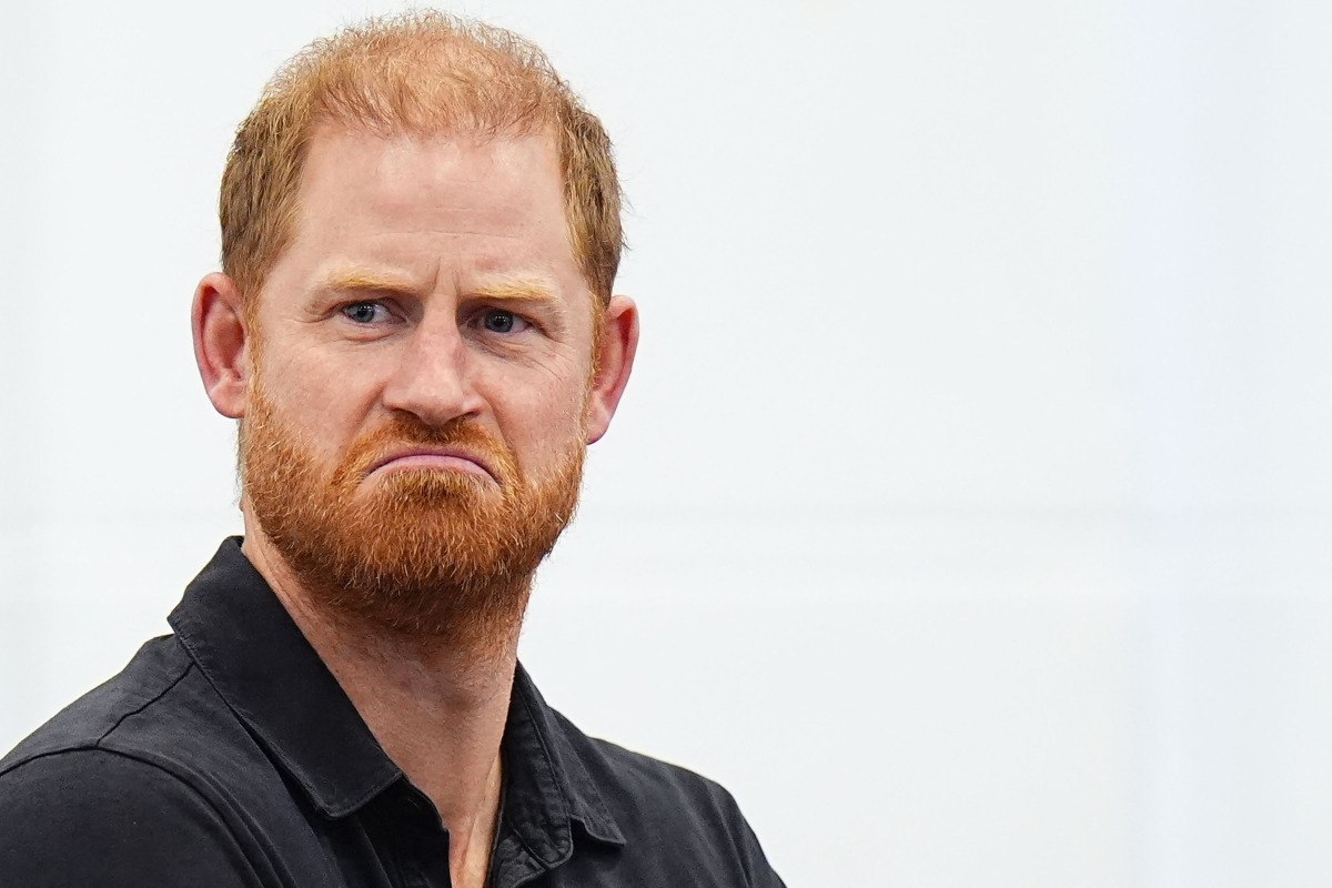Britain's Prince Harry, Duke of Sussex reacts during a panel discussion during his visit to Ninestiles School, in Birmingham, central England on September 18, 2026, as part of the launch of the INSPIRE education programme ahead of the Invictus Games in Birmingham in 2027. Photo by Aaron Chown / POOL / AFP