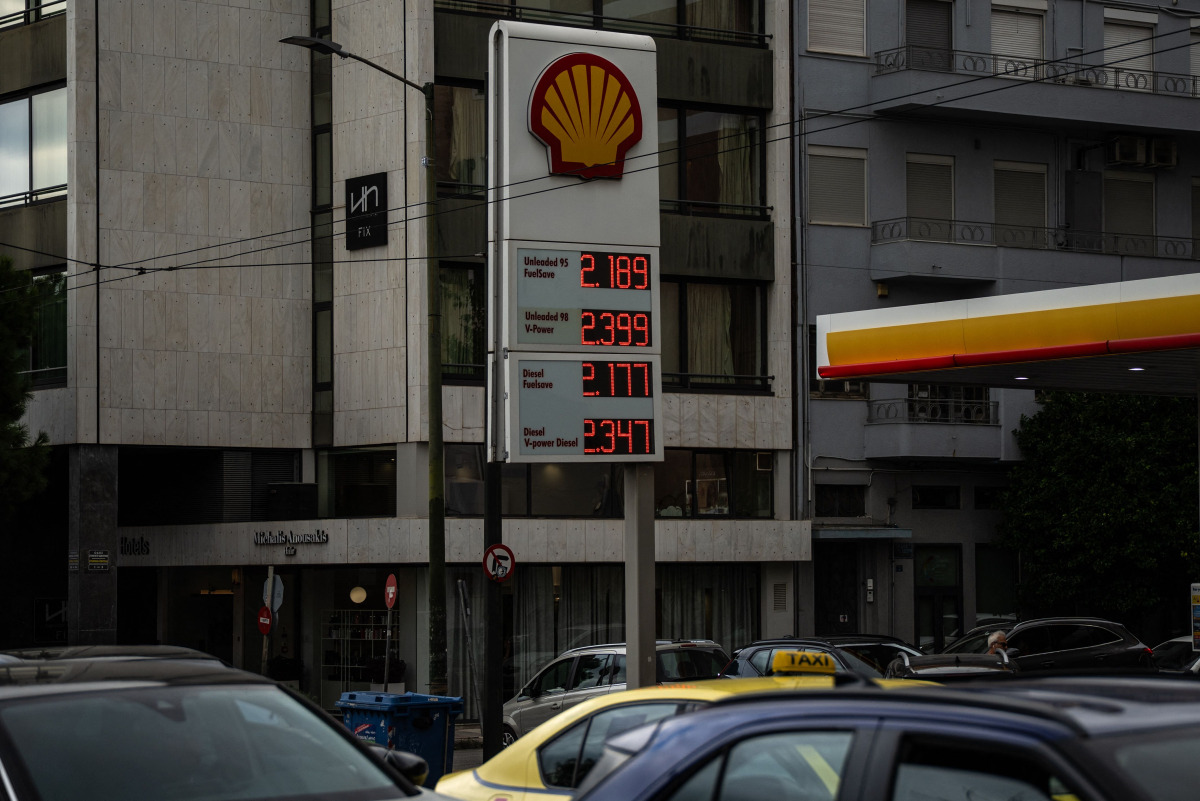 This photograph shows a digital board displaying fuel prices near a filling station in Athens on September 30, 2026. (Photo by Angelos TZORTZINIS / AFP)