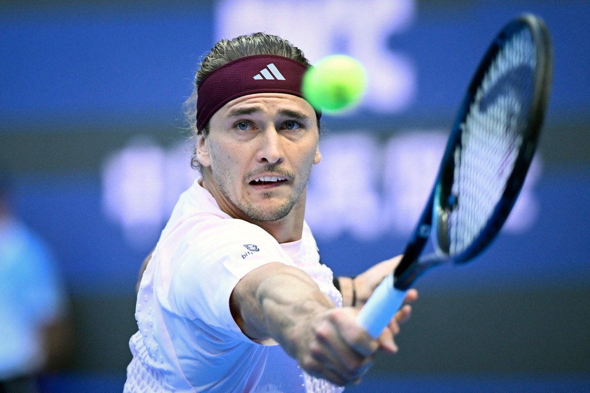 Germany's Alexander Zverev hits a return to Britain's Cameron Norrie during their men's singles first round tennis match at the China Open tennis tournament in Beijing on October 1, 2026. (Photo by WANG Zhao / AFP)