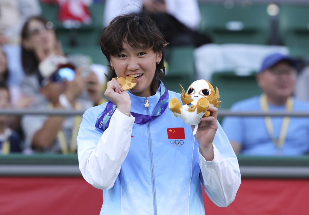 Gold medalist Wang Xiyu of China poses during the awarding ceremony for the women's singles of tennis at the 20th Asian Games Aichi-Nagoya 2026 in Nagoya, Japan, Oct. 2, 2026. (Xinhua/Li Bo)