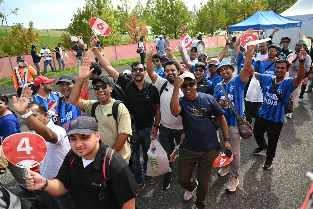 Indian fans arrive for the men's cricket final between Pakistan and India during the 2026 Asian Games at the Korogi Athletic Park in Nisshin on October 3, 2026. (Photo by Andrew Caballero-Reynolds/ AFP)