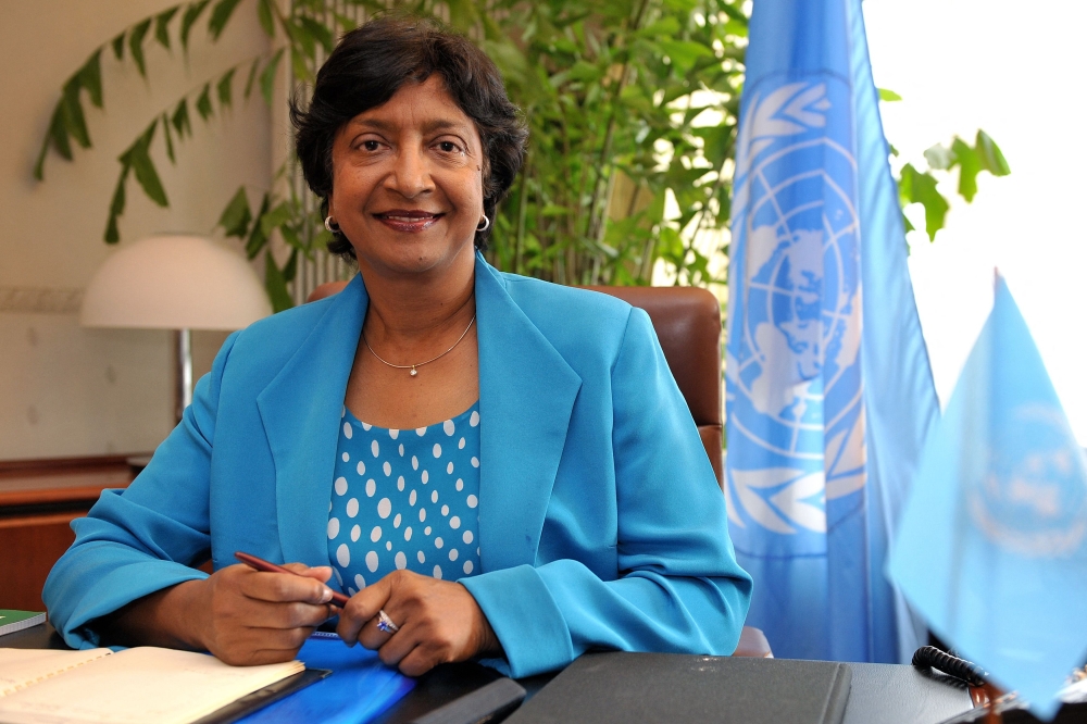 (FILES) New United Nations High Commissioner for Human Rights, South African judge Navanethem (Navi) Pillay poses in her office at the Palais Wilson, headquarters of the specialised UN agency as she takes up her post on Spetember 1, 2008 in Geneva. (Photo by Fabrice COFFRINI / AFP)
