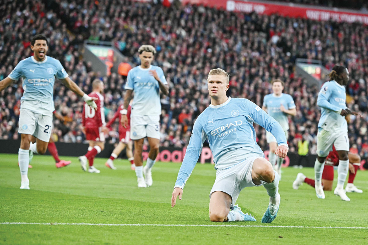 Manchester City’s Erling Haaland (right) celebrates after scoring the opening goal.