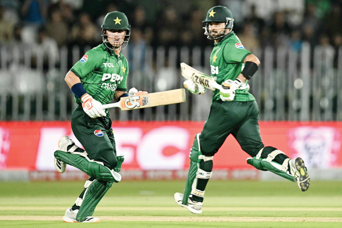 Pakistan’s captain Sahibzada Farhan (right) and Maaz Sadaqat run between the wickets during the second T20I.