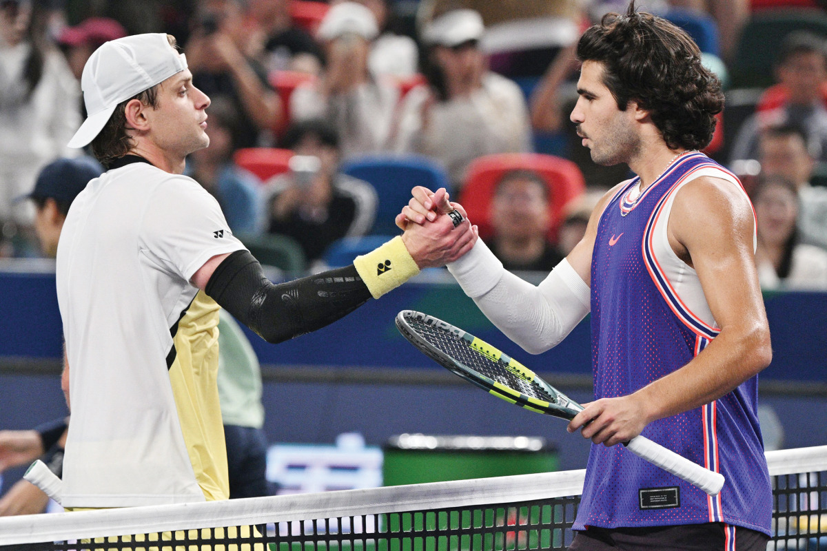 Belgium’s Zizou Bergs (left) shakes hands with Spain’s Carlos Alcaraz at the end of their match.