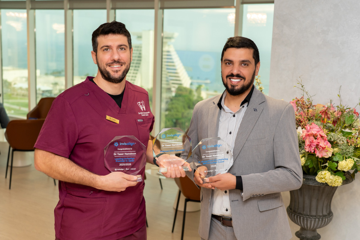Dr. Yaser Hamdoun (left) receiving the awards. 