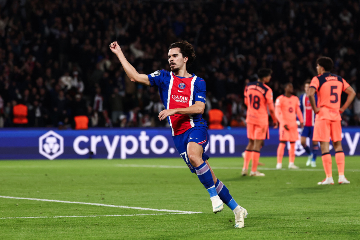 PSG's Portuguese midfielder #17 Vitinha celebrates after scoring his team third goal during the UEFA Champions League first round day 3 football match between Paris Saint-Germain (PSG) and FC Barcelona at the Parc de Princes stadium in Paris on October 20, 2026. (Photo by FRANCK FIFE / AFP)