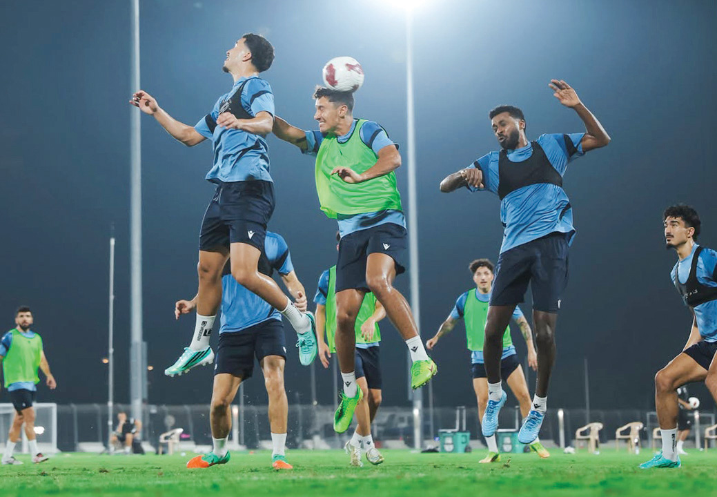Al Ahli players take part in a training session.