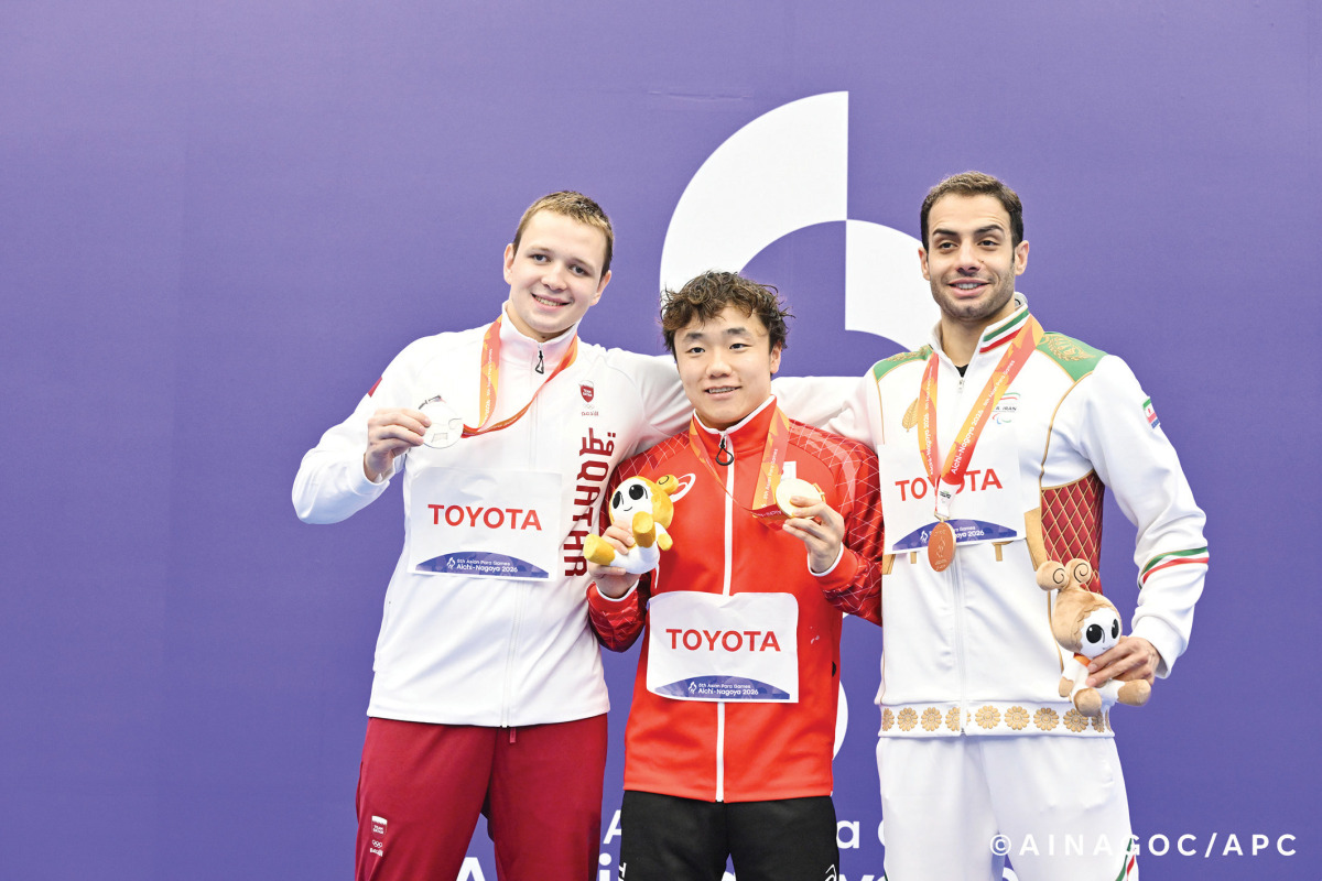 Qatar's Shamil Shahov (left) with gold winner Genki Saito of Japan and bronze medallist Abadi Karimi Jahan of Iran during the men’s 100m breaststroke (SB12) podium ceremony.