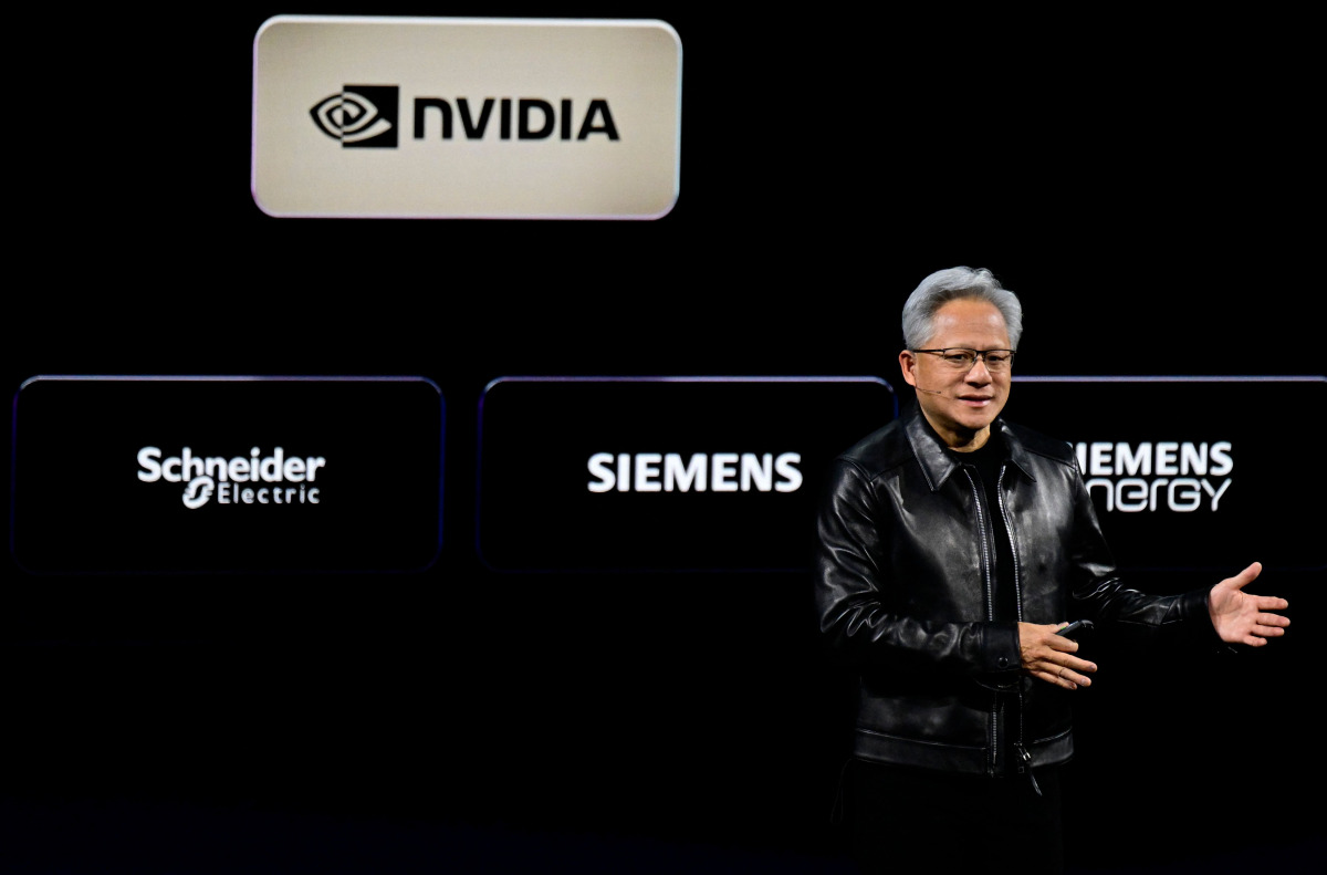 Co-founder, President and CEO of US technology company Nvidia, Jensen Huang delivers his keynote speech during the Nvidia GTC Berlin 2026 Artificial Intelligence conference, on October 21, 2026 in Berlin. (Photo by John MACDOUGALL / AFP)