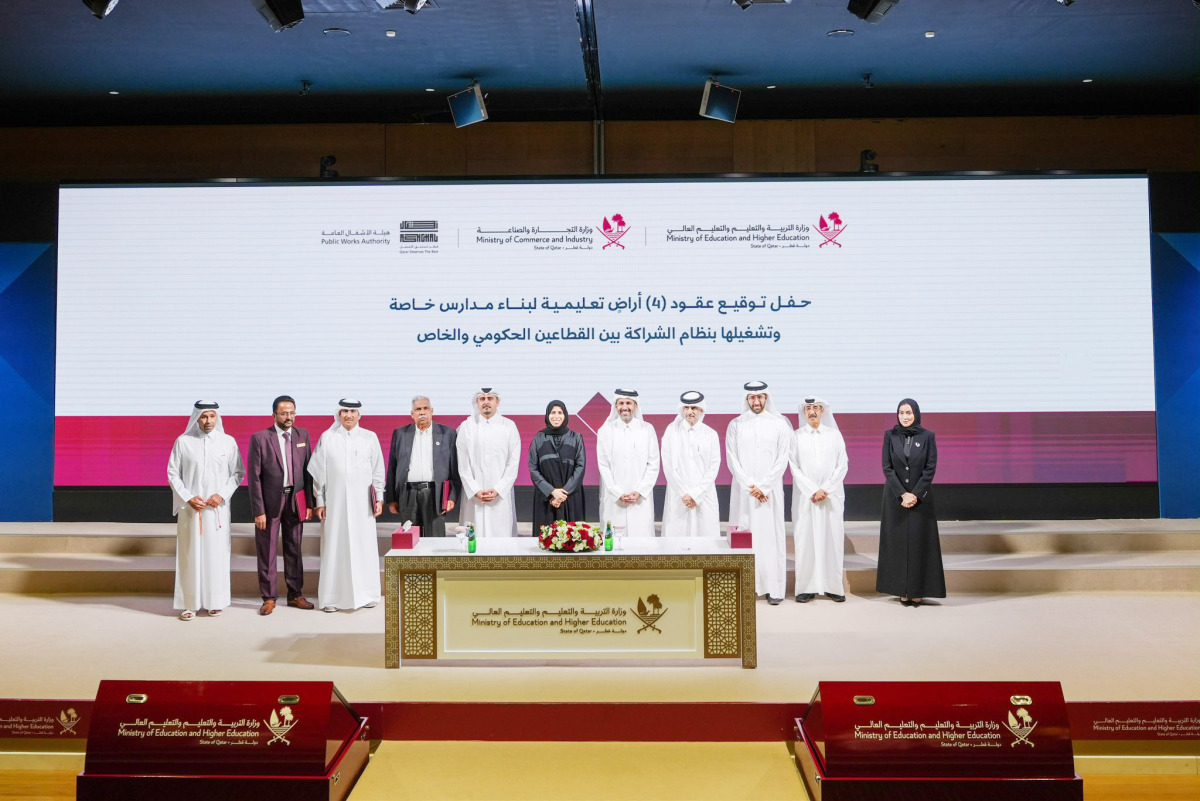 Minister of Education and Higher Education H E Lolwah bint Rashid Al Khater, Minister of Commerce and Industry H E Sheikh Faisal bin Thani bin Faisal Al Thani, and other officials during signing ceremony.